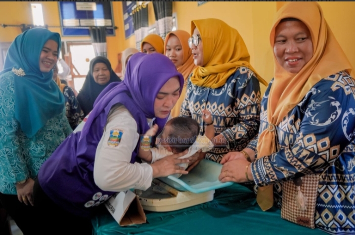 Hari Posyandu Nasional Tahun 2026 di Pulau Pisang Dihadiri Ketua Tim Penggerak PKK Pesisir Barat 