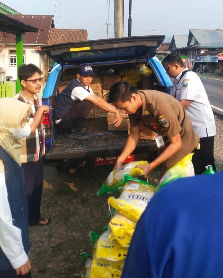 Staf Kecamatan Karya Penggawa Hadiri Gerakan Serentak Penetrasi Pasar Kabupaten Pesisir Barat